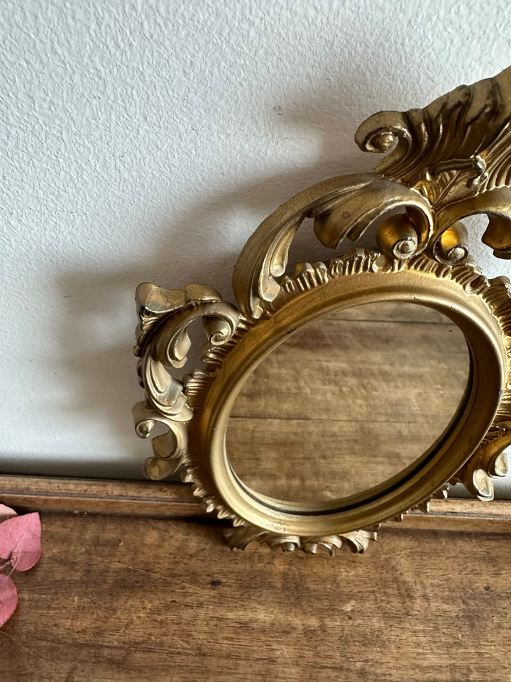 Miroir style rococo en plastique doré