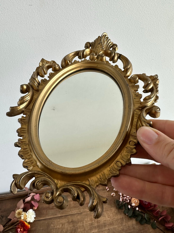 Miroir style rococo en plastique doré