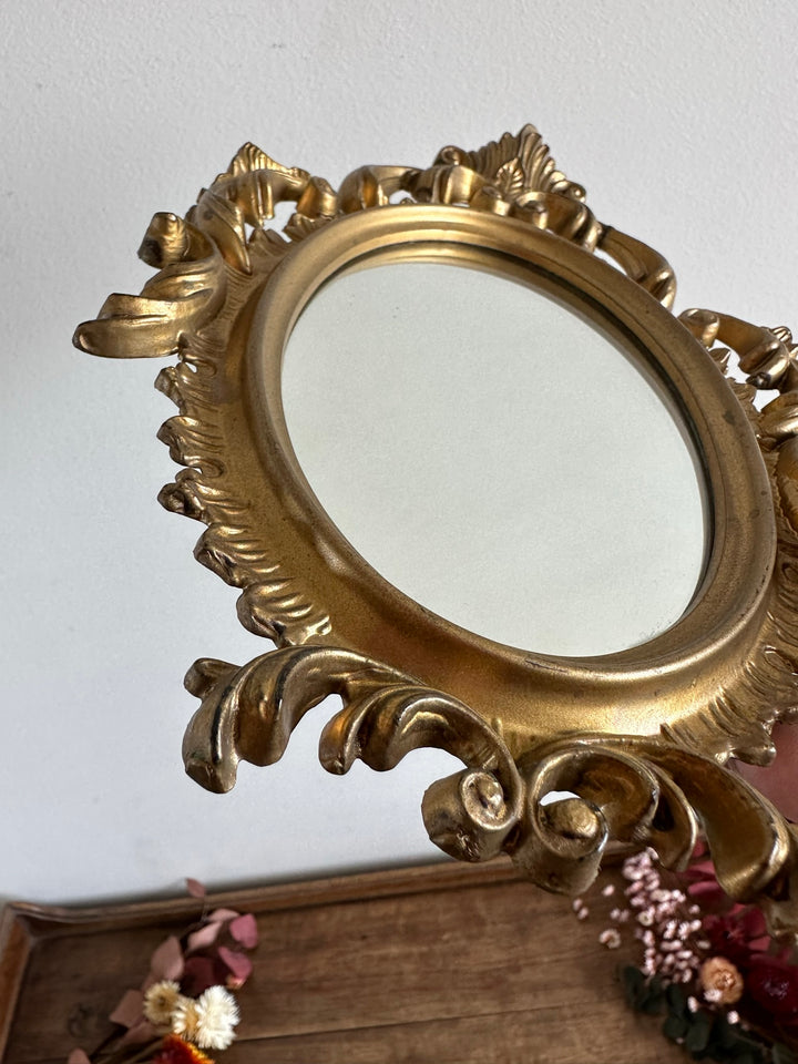 Miroir style rococo en plastique doré