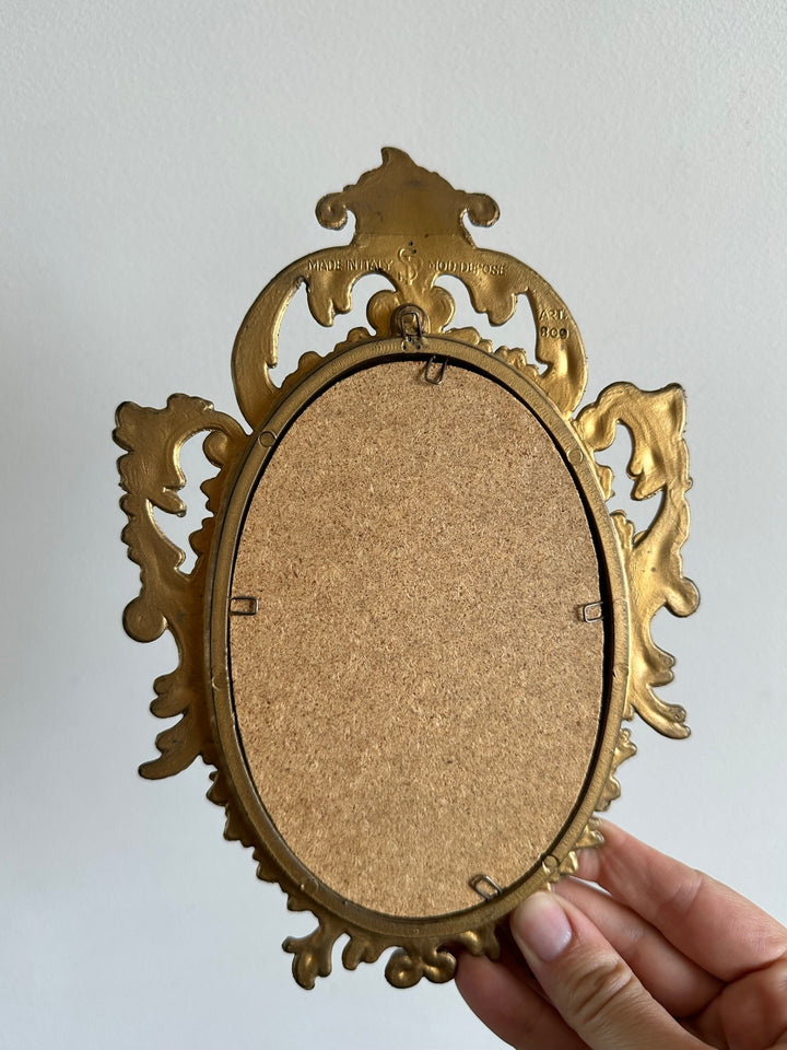 Miroir style rococo en plastique doré