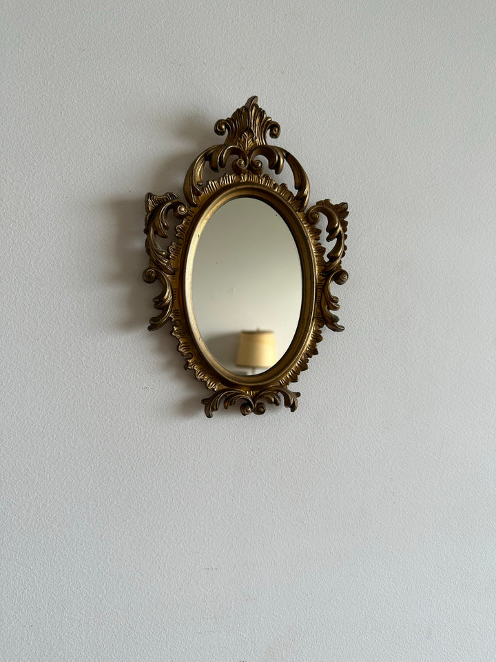 Miroir style rococo en plastique doré