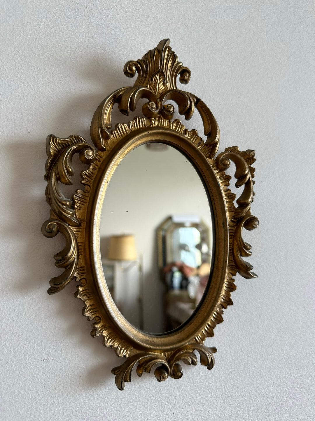 Miroir style rococo en plastique doré