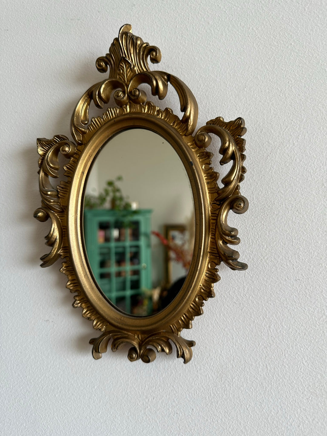 Miroir style rococo en plastique doré