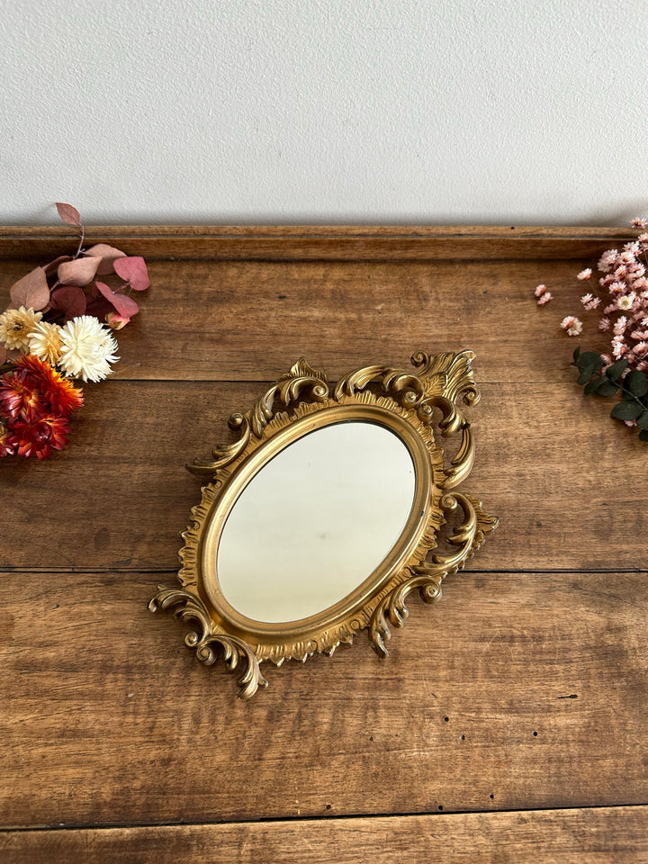 Miroir style rococo en plastique doré