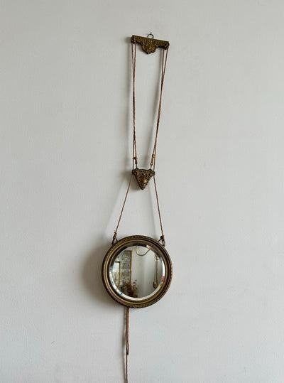 Miroir biseauté structure en métal mordoré suspension corde à levier