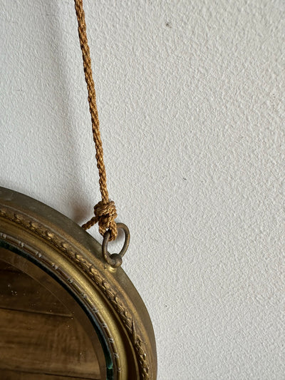 Miroir biseauté structure en métal mordoré suspension corde à levier