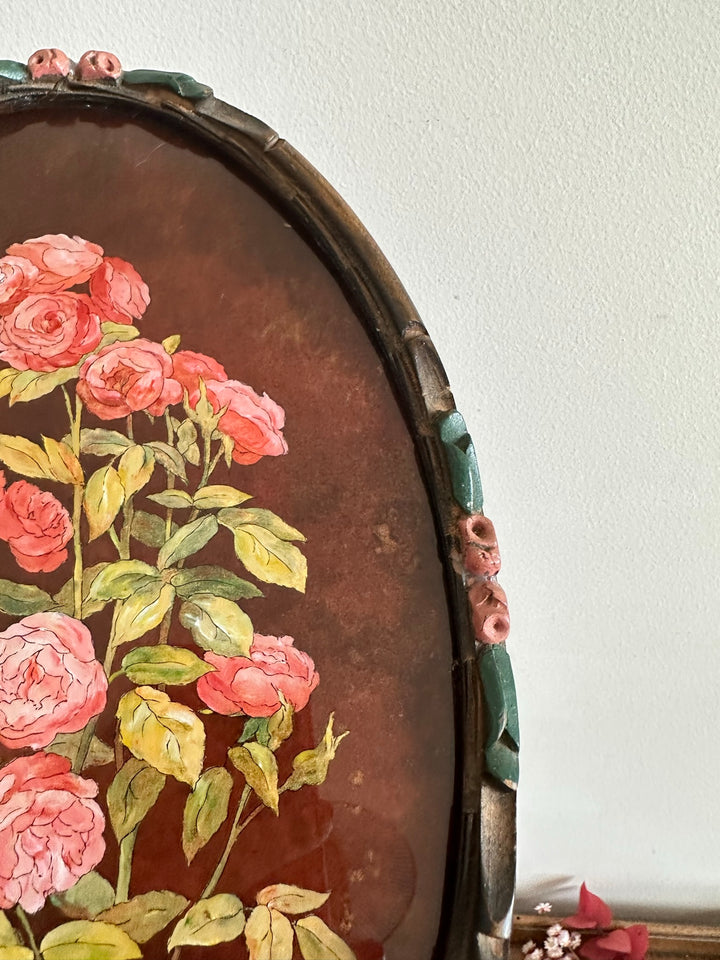 Peinture de roses reflets dorés signée dans cadre sculpté