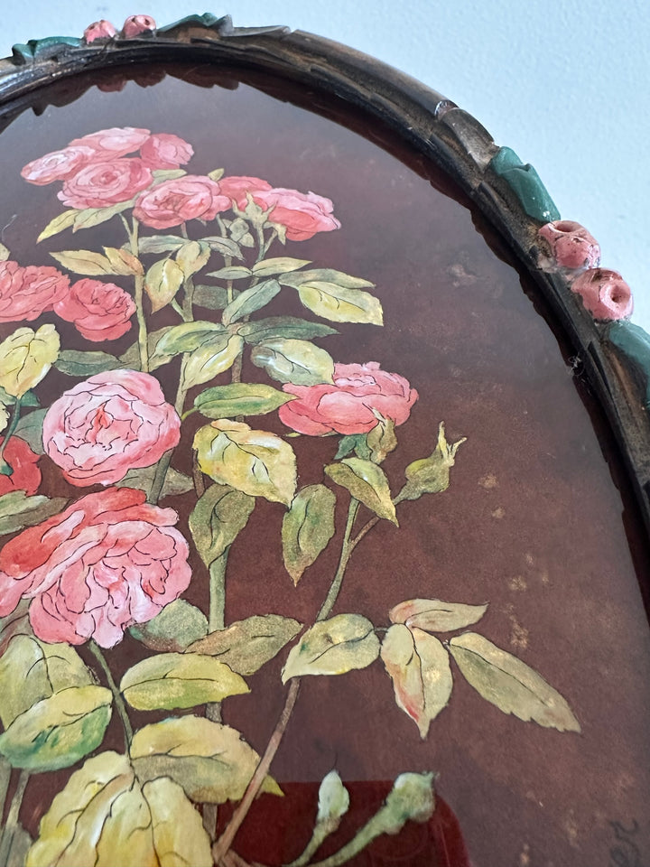 Peinture de roses reflets dorés signée dans cadre sculpté