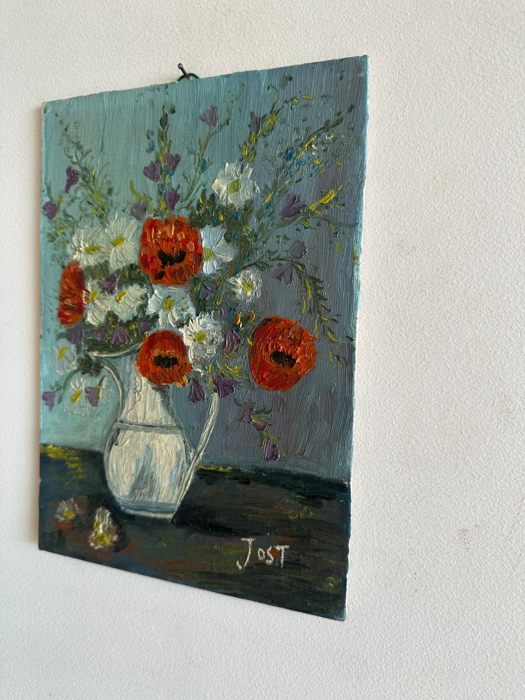 Tableau bouquet de coquelicots sur fond bleu