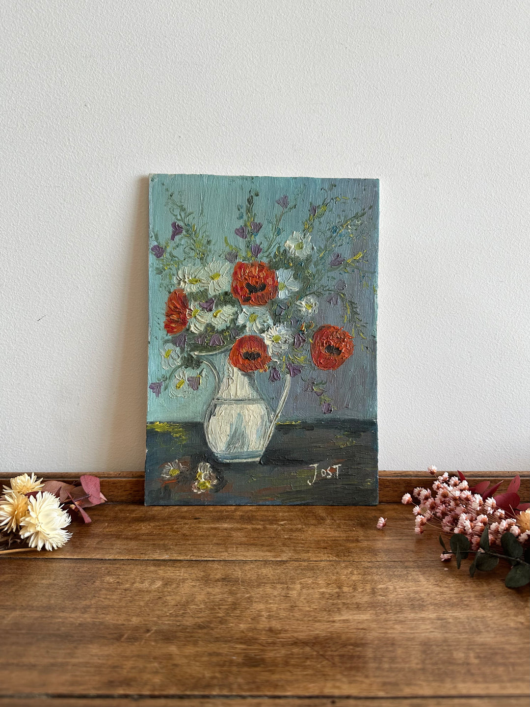 Tableau bouquet de coquelicots sur fond bleu