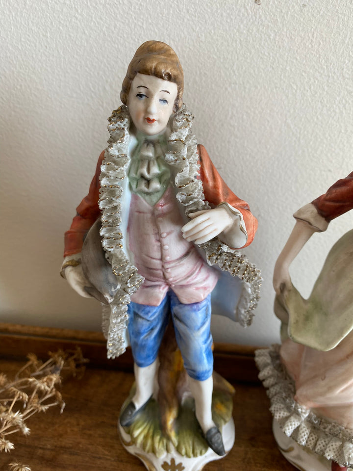 Statuettes porcelaine fabrication pologne couple en costumes d'époque