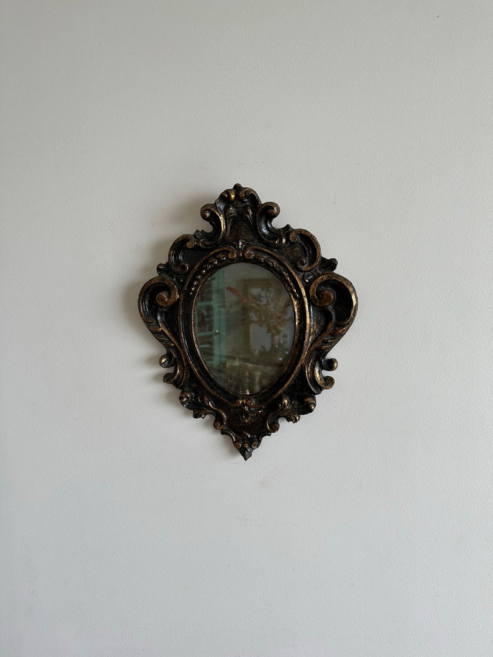 Miroir florentin en bois couleur noir et or