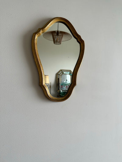 Miroir en bois doré chantourné