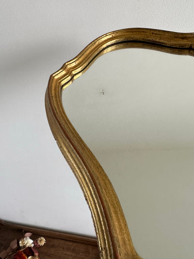 Miroir en bois doré chantourné