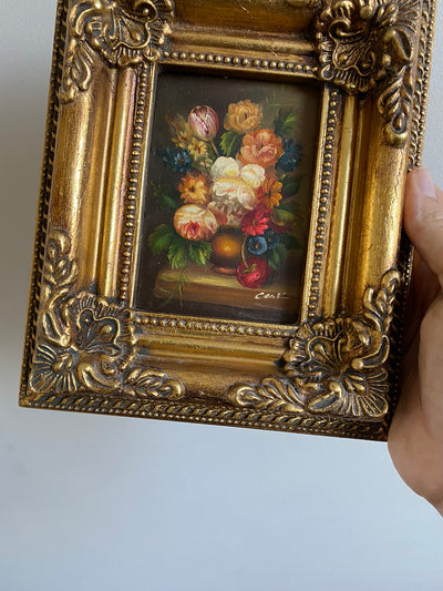 Peinture bouquet de fleurs dans cadre baroque doré