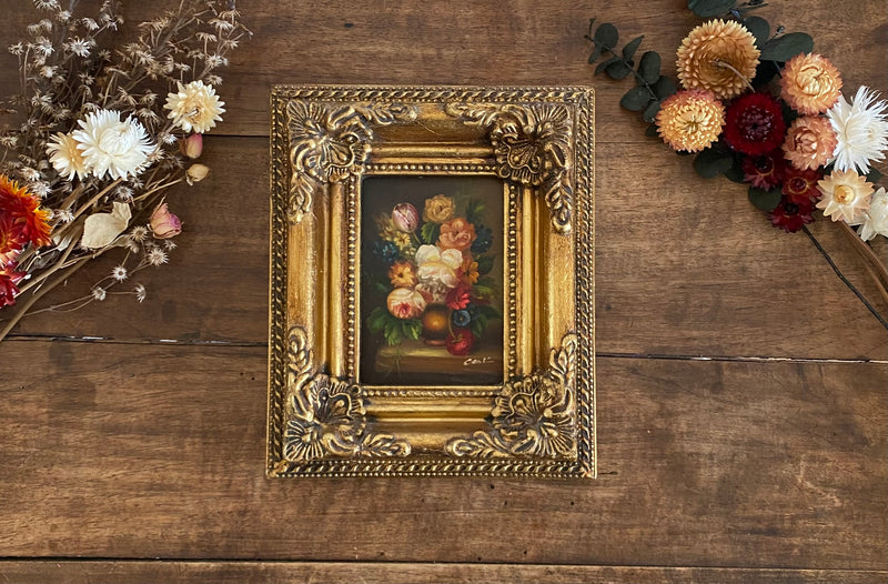 Peinture bouquet de fleurs dans cadre baroque doré