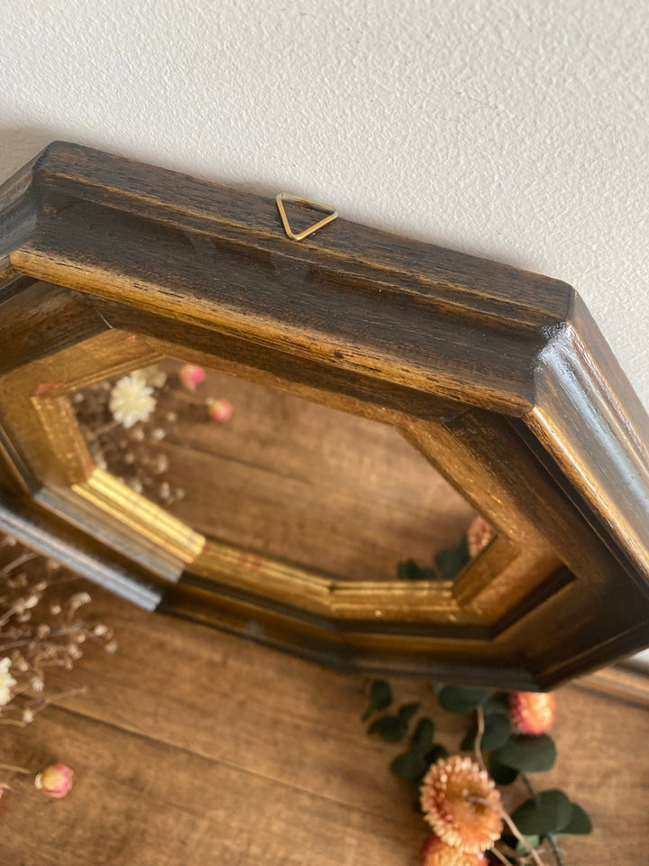 Miroir au cadre octogonal en bois doré