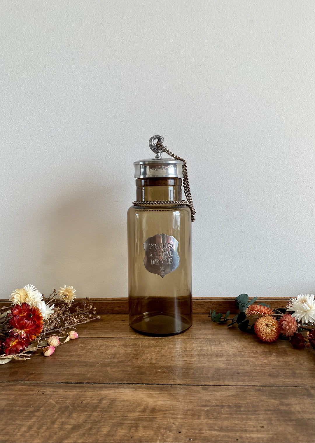 Bouteille pour fruits à l'eau de vie en verre fumé