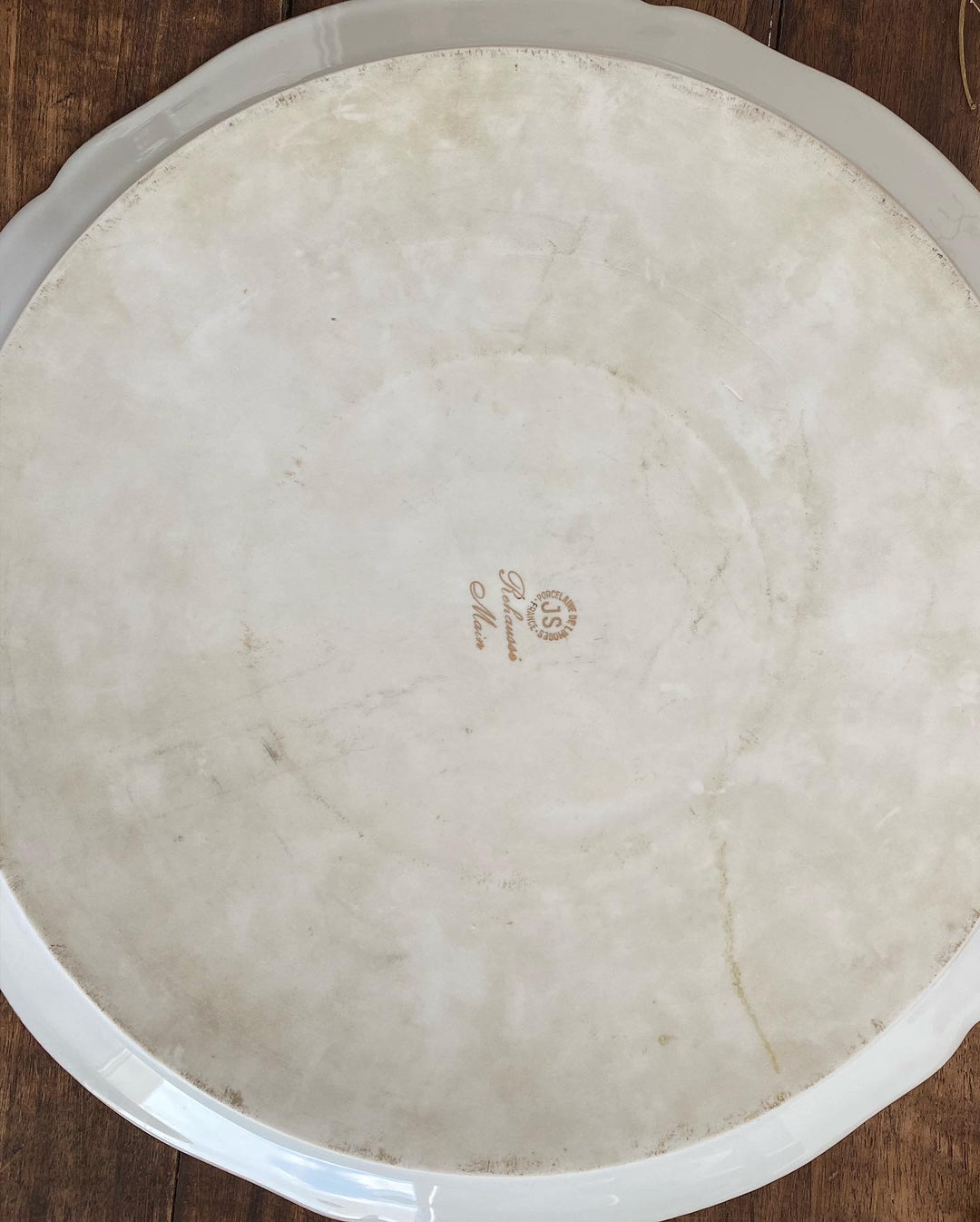 Plat de service Porcelaine de limoges signée JS avec frise dorée