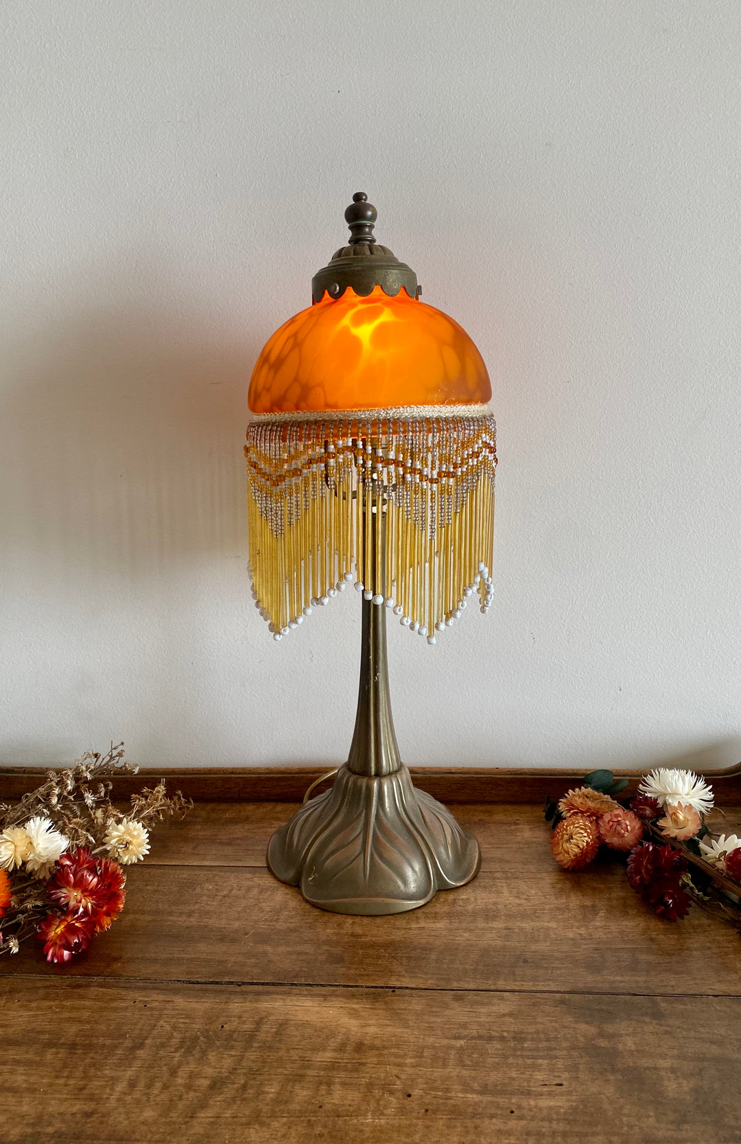 Lampe abat jour rideau style charleston verre orangé