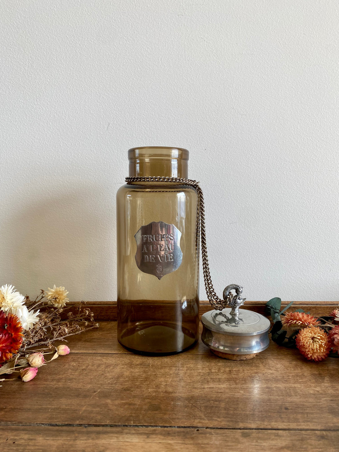 Bouteille pour fruits à l'eau de vie en verre fumé