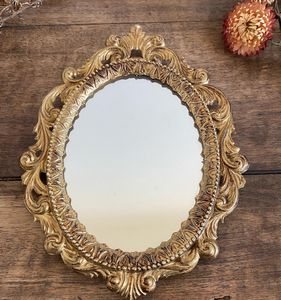 Petit miroir doré style baroque