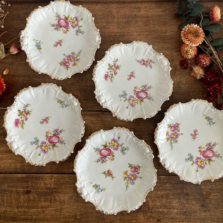 Assiettes à pain Limoges bords dorés et motifs fleurs